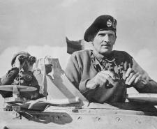 Bernard Montgomery watches the actions unfold from a tank