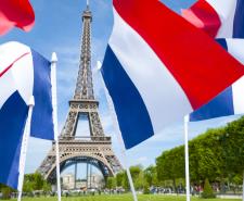 French flags in front of the Eiffel Tower