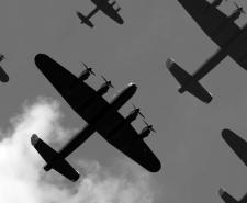 Lancaster bombers flying overhead.