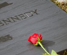 A red rose lying on JFK's grave
