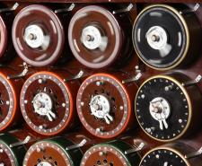 Rotating wheels on a cipher machine labelled with letters of the alphabet