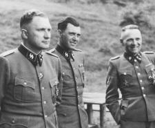 Rudolf Höss (R) stands with Josef Mengele (C) and Richard Baer (L)