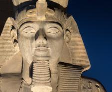 The statue of Ramses II Illuminated at night in the temple of Luxor