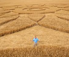 Bradley Walsh standing in a crop circle